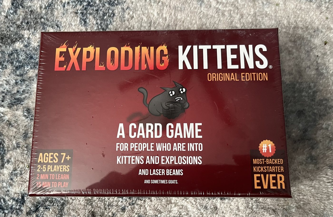 Exploding Kittens Original Edition box, front, still in its shrink wrap