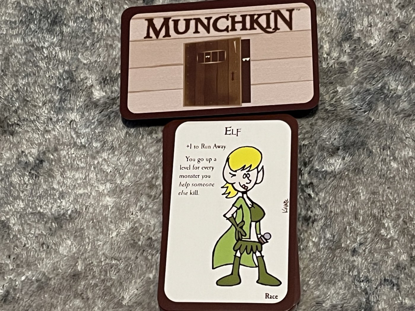 The Munchkin Elf race card: +1 to Run Away, and a level for every monster you help someone else kill