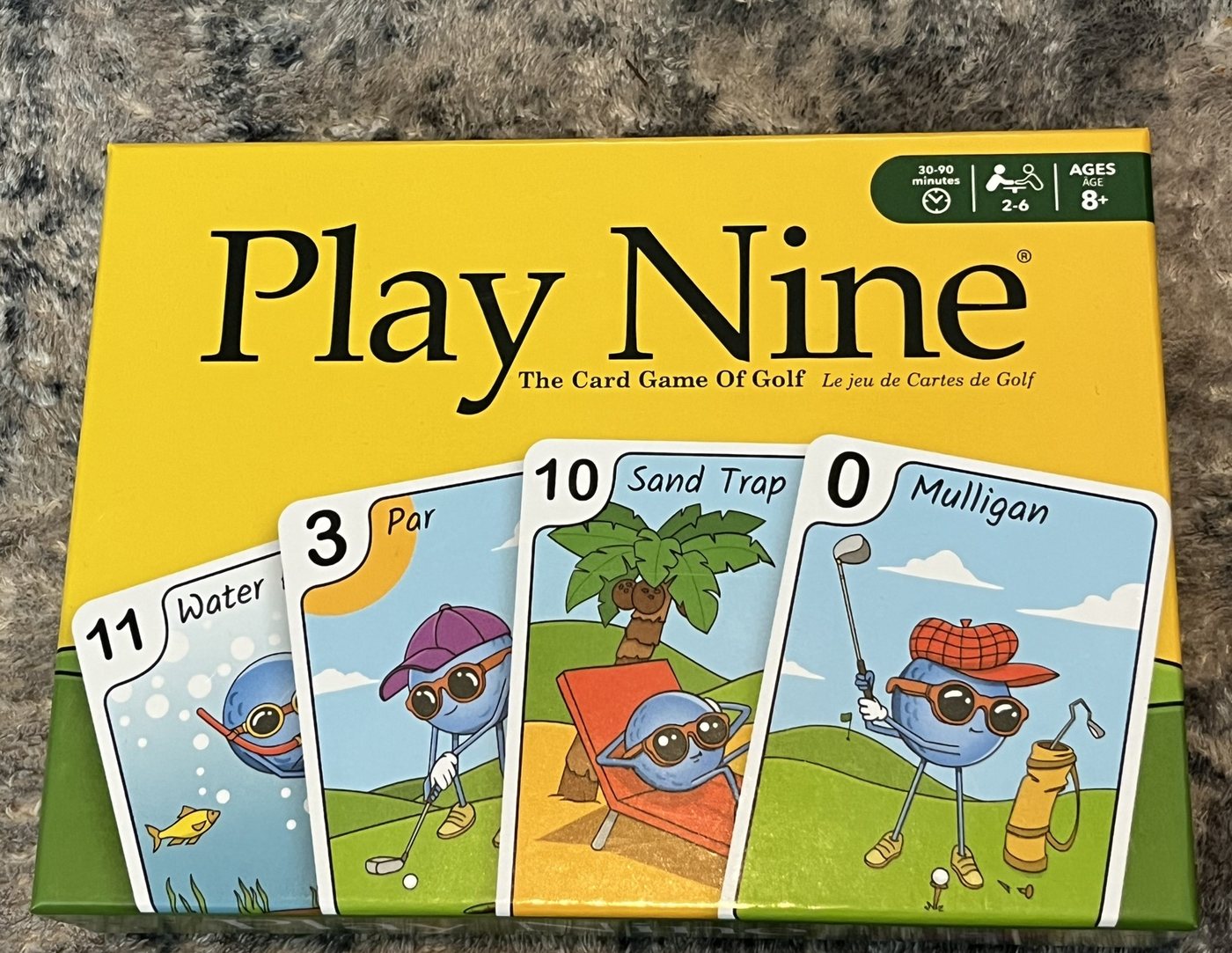 Front of the Play Nine box showing the Water Hazard, Par, Sand Trap and Mulligan cards