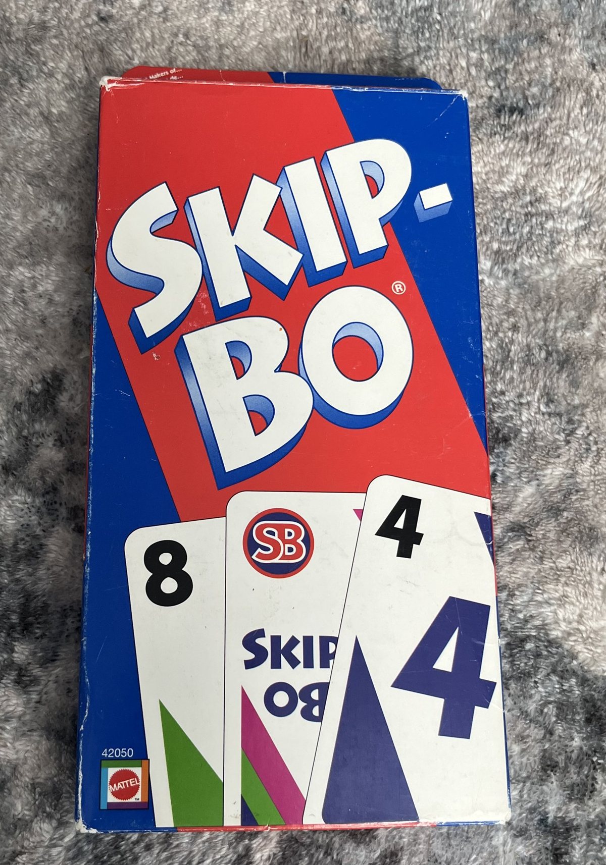 Front of a Mattel Skip-Bo card game box