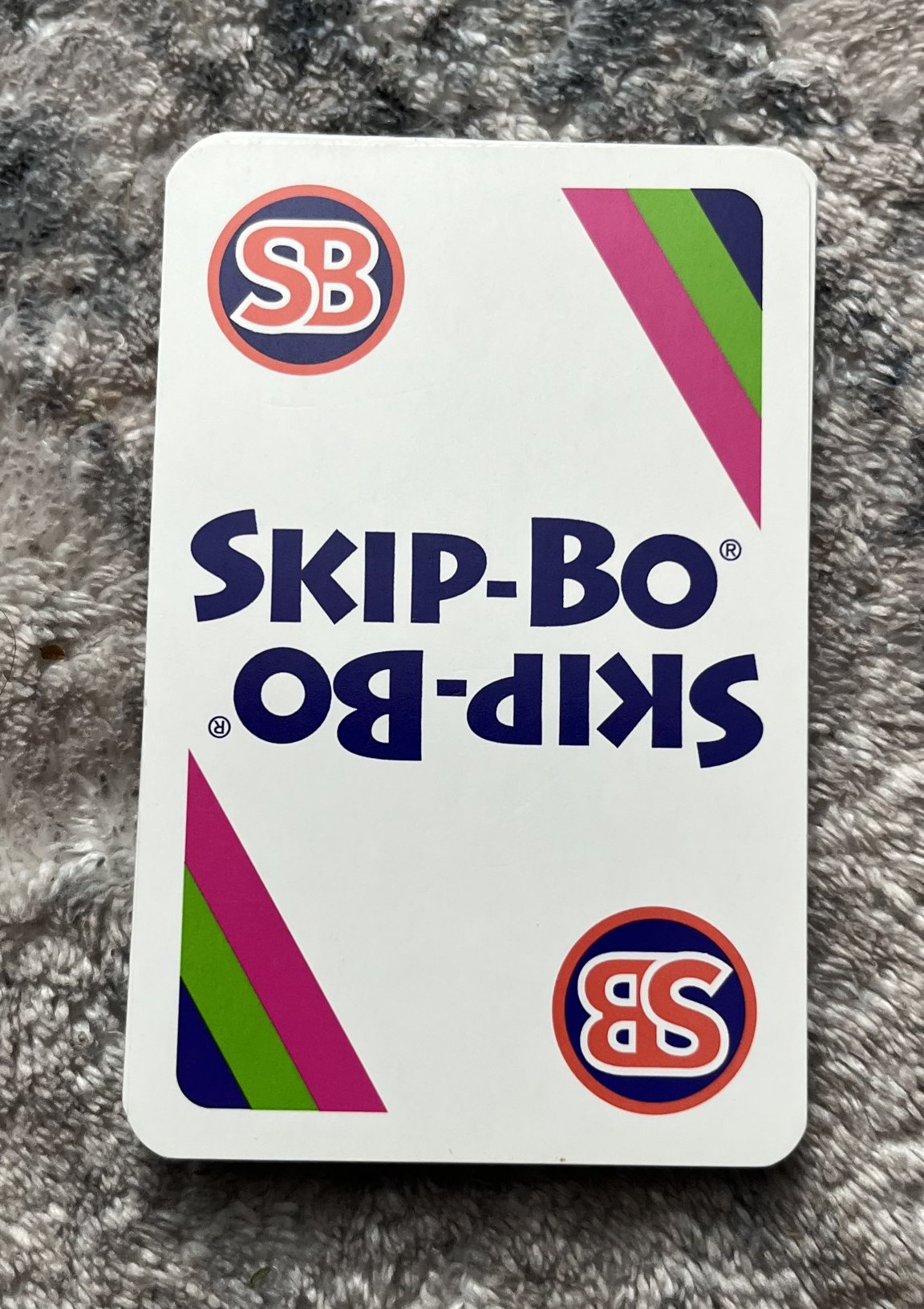 A Skip-Bo wild card from the Mattel edition